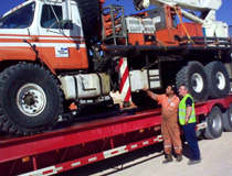 Crane & Safety advisor discussing with the operator of this National crane which had to be recovered from the job site, Central Sahara