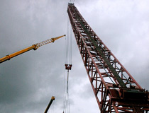 Crane & Safety was heavily involved in this complex 3 crane lift to install the central arch of this motorway bridge in the UK 